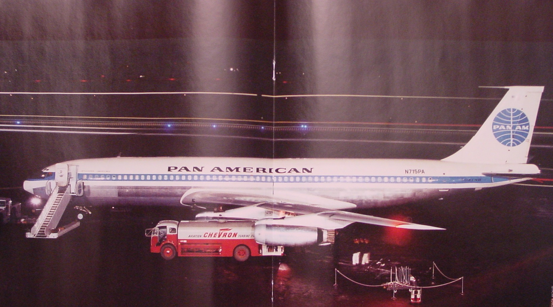 A night shot of Pan Am Boeing 707 tail number N715PA Clipper Liberty Bell.